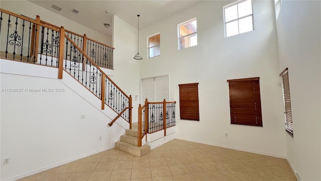 3001 SW 156th Ave, Miami, FL 33185 - stairs featuring a towering ceiling and tile patterned floors
