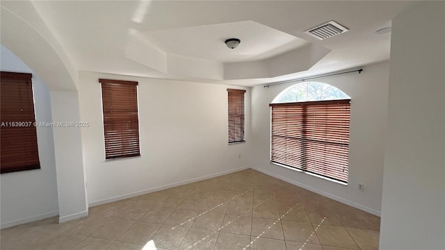 3001 SW 156th Ave, Miami, FL 33185 - tiled spare room with a tray ceiling and baseboards