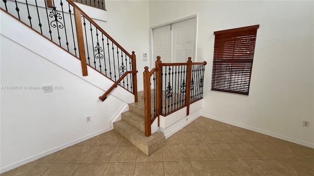 3001 SW 156th Ave, Miami, FL 33185 - staircase with baseboards and tile patterned floors
