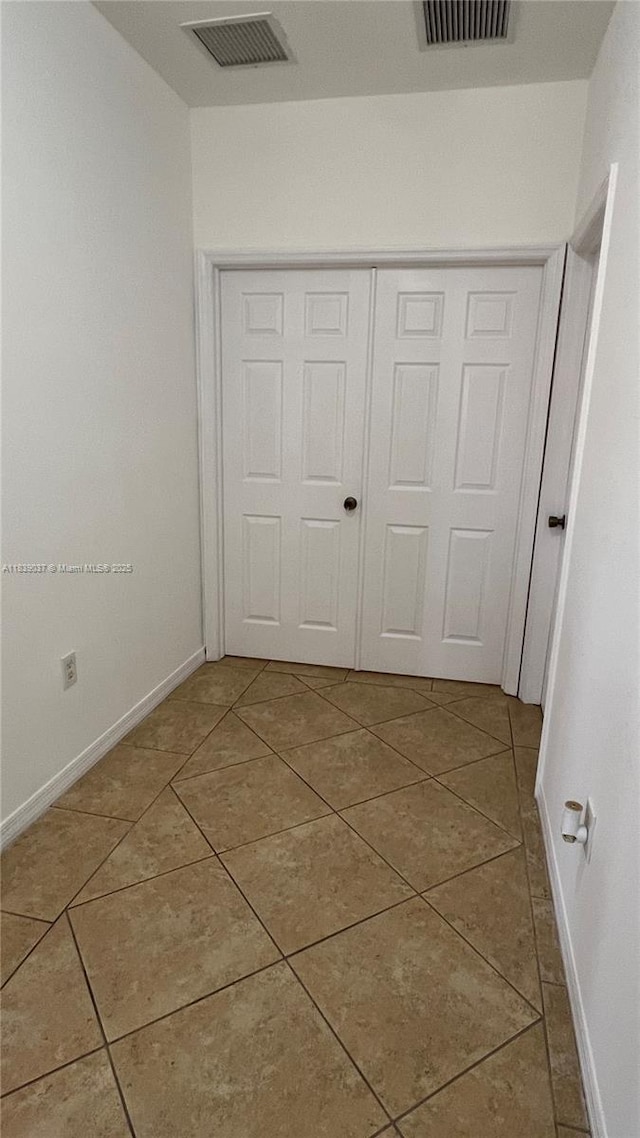 3001 SW 156th Ave, Miami, FL 33185 - unfurnished bedroom with tile patterned floors and a closet