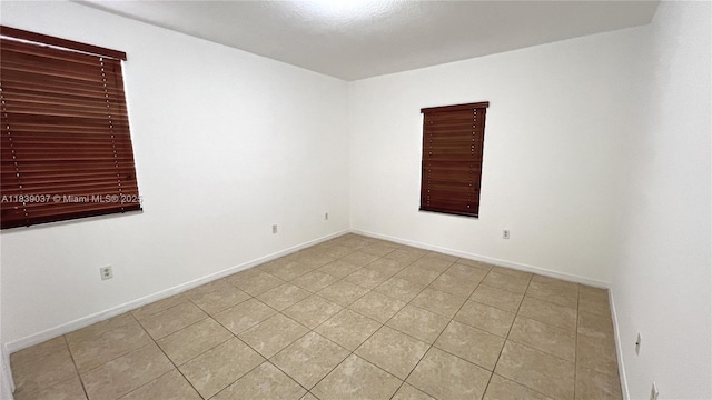 3001 SW 156th Ave, Miami, FL 33185 - unfurnished room with light tile patterned floors
