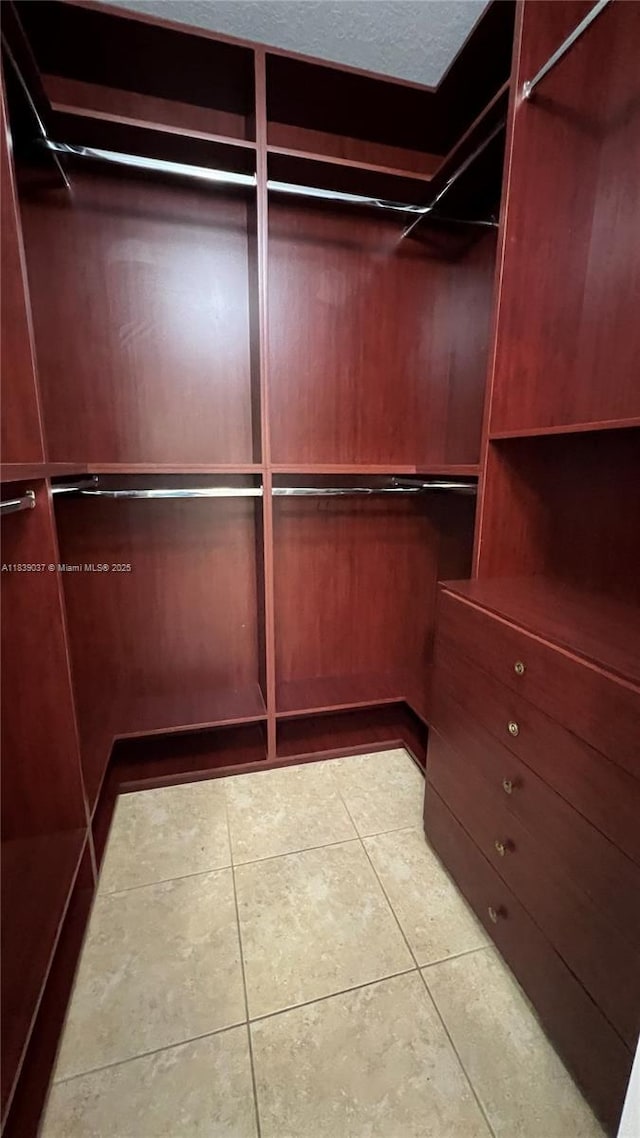 3001 SW 156th Ave, Miami, FL 33185 - walk in closet with tile patterned floors and elevator