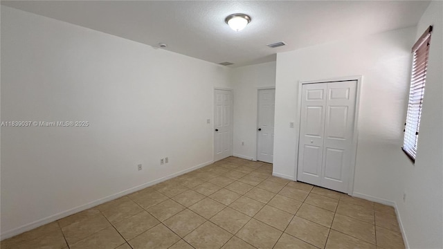 3001 SW 156th Ave, Miami, FL 33185 - empty room with light tile patterned floors and baseboards