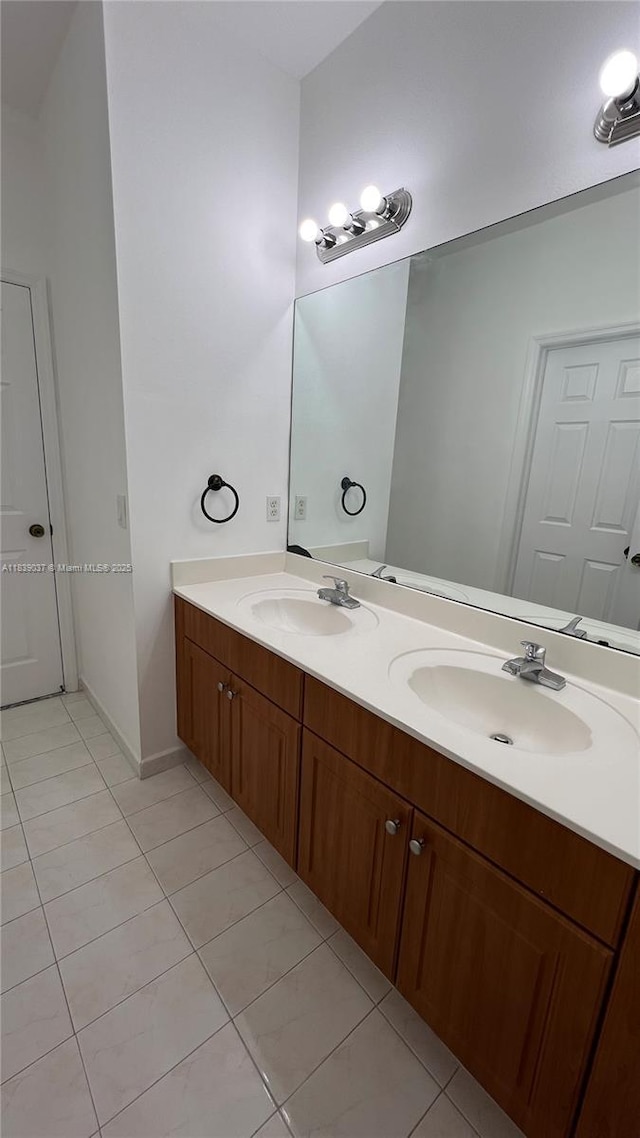 3001 SW 156th Ave, Miami, FL 33185 - bathroom featuring double vanity and tile patterned floors