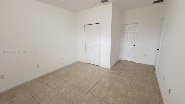 3001 SW 156th Ave, Miami, FL 33185 - unfurnished bedroom with light tile patterned floors and a closet