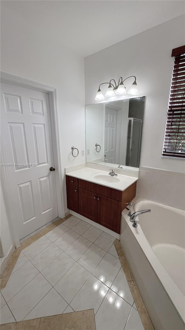 3001 SW 156th Ave, Miami, FL 33185 - bathroom featuring tile patterned flooring, a garden tub, and vanity