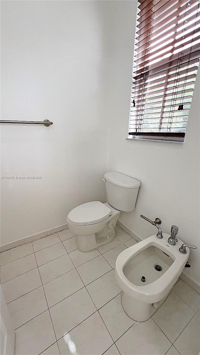 3001 SW 156th Ave, Miami, FL 33185 - half bathroom with a bidet and marble look tiles