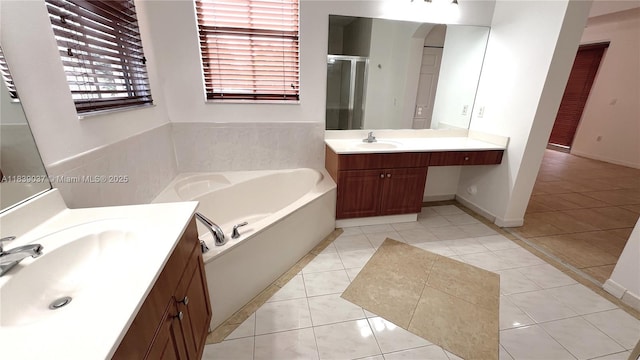 3001 SW 156th Ave, Miami, FL 33185 - full bath with tile patterned flooring, a shower stall, a garden tub, and two vanities