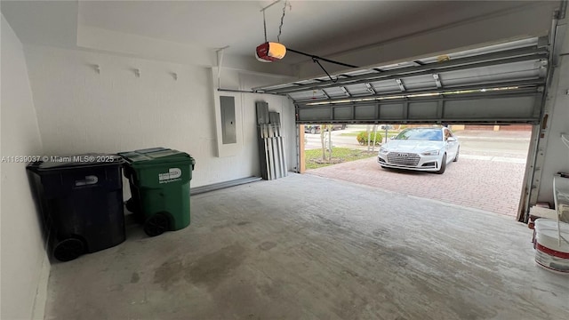 3001 SW 156th Ave, Miami, FL 33185 - garage featuring electric panel and a garage door opener