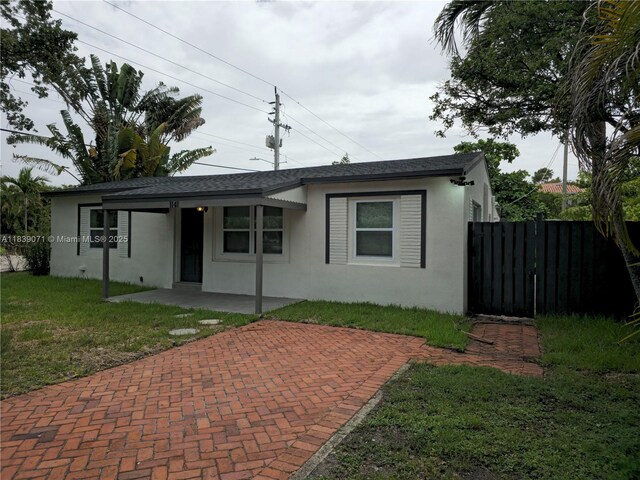 1141 SW 8th Ter, Fort Lauderdale, FL 33315 - view of front of property with stucco siding