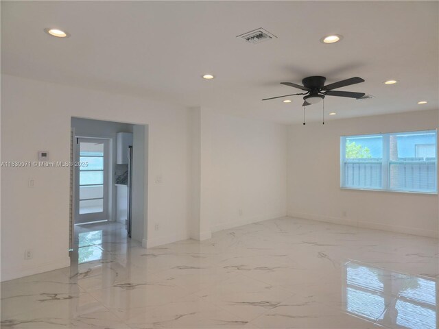 1141 SW 8th Ter, Fort Lauderdale, FL 33315 - spare room with recessed lighting, a ceiling fan, and light marble finish flooring