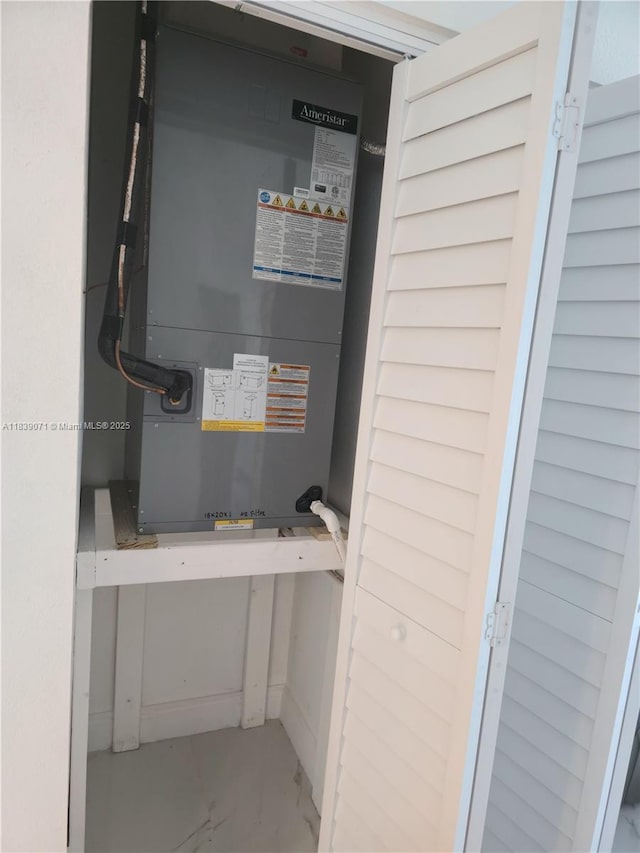 1141 SW 8th Ter, Fort Lauderdale, FL 33315 - utility room with heating unit