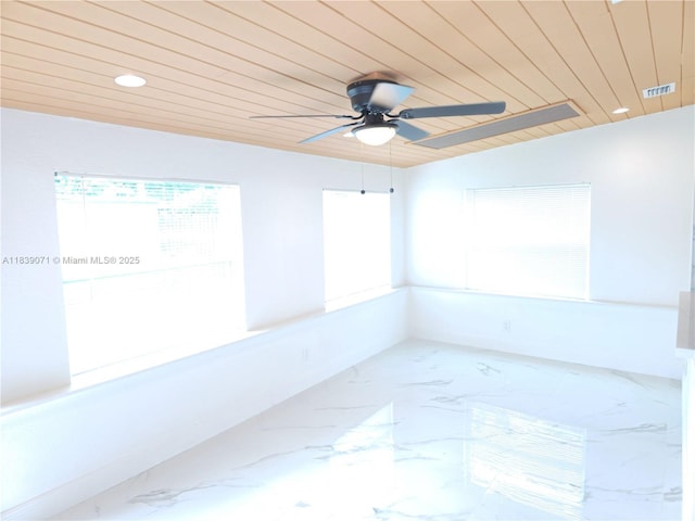 1141 SW 8th Ter, Fort Lauderdale, FL 33315 - empty room featuring a ceiling fan, wooden ceiling, marble look tile flooring, and recessed lighting