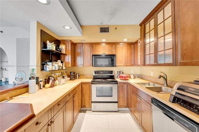 919 Hillcrest Dr Unit 704, Hollywood, FL 33021 - kitchen featuring black microwave, stainless steel range with electric stovetop, white dishwasher, light countertops, and recessed lighting