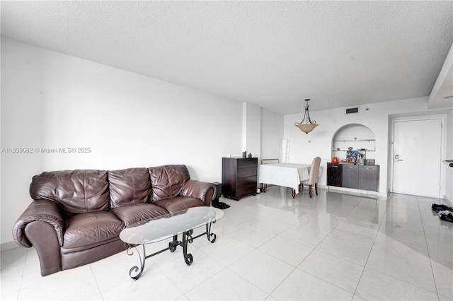 919 Hillcrest Dr Unit 704, Hollywood, FL 33021 - living area with a textured ceiling and light tile patterned floors
