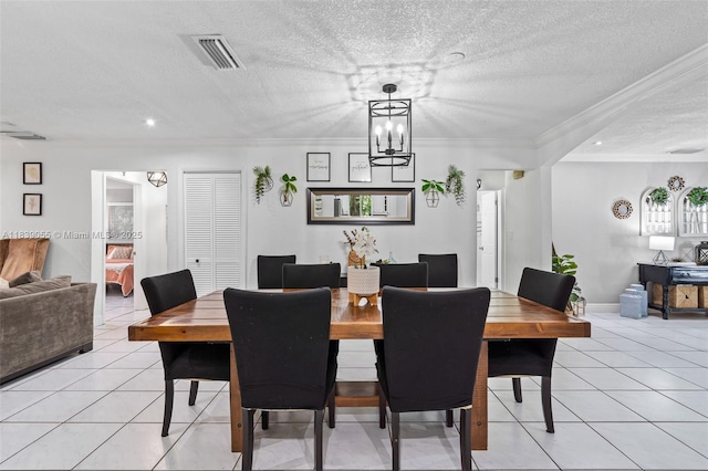 1650 SW 17th St, Miami, FL 33145 - dining room featuring crown molding, light tile patterned floors, a textured ceiling, and a chandelier