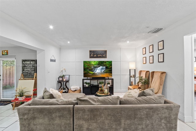 1650 SW 17th St, Miami, FL 33145 - living area featuring ornamental molding, light tile patterned floors, and recessed lighting