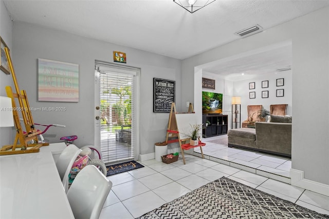 1650 SW 17th St, Miami, FL 33145 - living room with baseboards and light tile patterned floors