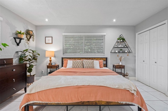 1650 SW 17th St, Miami, FL 33145 - bedroom with a closet, light tile patterned floors, and recessed lighting