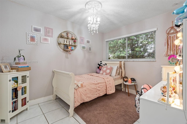 1650 SW 17th St, Miami, FL 33145 - bedroom with a chandelier, a textured ceiling, and light tile patterned flooring