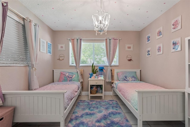 1650 SW 17th St, Miami, FL 33145 - tiled bedroom with a chandelier