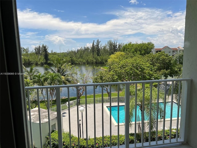 8200 SW 210th St Unit 308, Cutler Bay, FL 33189 - balcony featuring a water view, view of pool, and view of wooded area