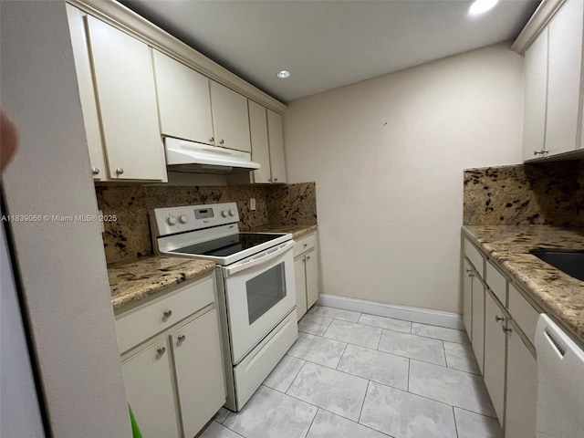 8200 SW 210th St Unit 308, Cutler Bay, FL 33189 - kitchen featuring white appliances, under cabinet range hood, backsplash, and recessed lighting