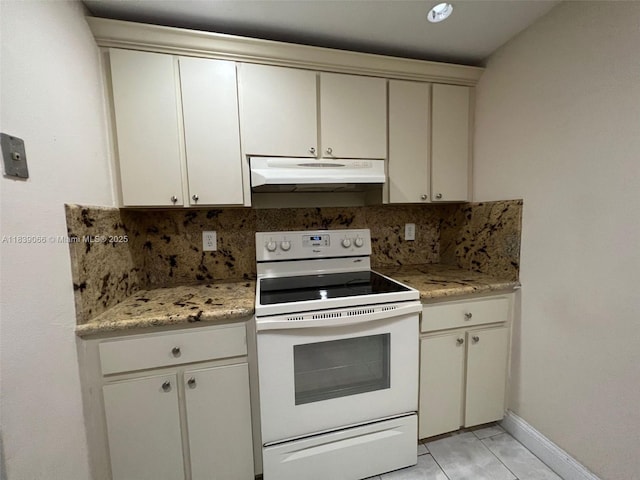 8200 SW 210th St Unit 308, Cutler Bay, FL 33189 - kitchen with under cabinet range hood, electric stove, and decorative backsplash