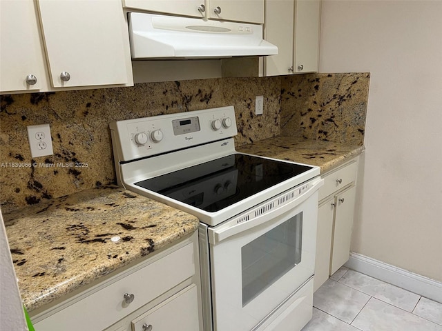 8200 SW 210th St Unit 308, Cutler Bay, FL 33189 - kitchen with white electric stove, under cabinet range hood, backsplash, and white cabinetry