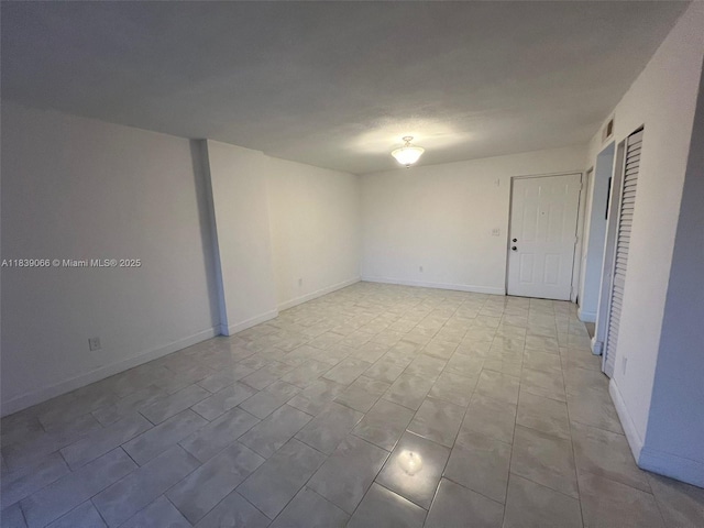 8200 SW 210th St Unit 308, Cutler Bay, FL 33189 - empty room with baseboards