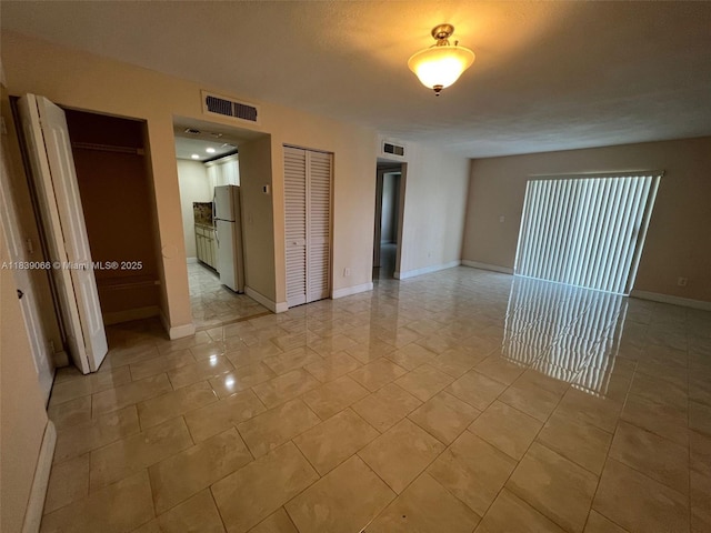 8200 SW 210th St Unit 308, Cutler Bay, FL 33189 - spare room featuring baseboards