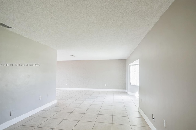 8390 NW 24th St, Sunrise, FL 33322 - unfurnished room with a textured ceiling and light tile patterned floors