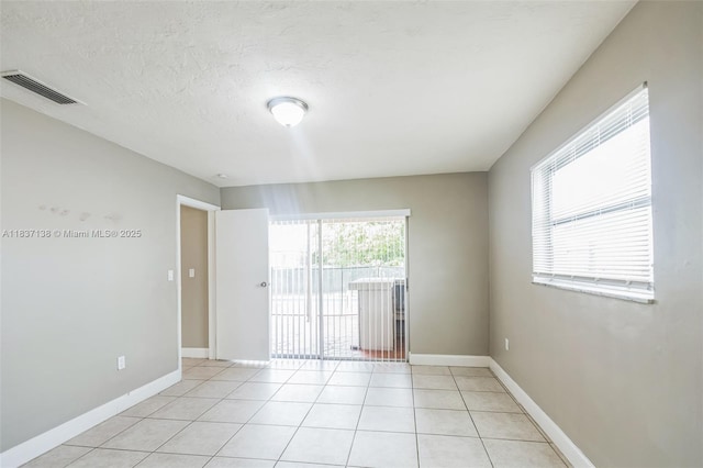 8390 NW 24th St, Sunrise, FL 33322 - unfurnished room featuring light tile patterned floors and baseboards