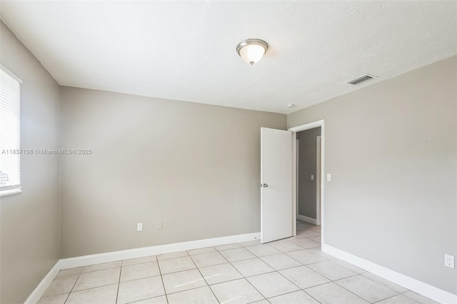 8390 NW 24th St, Sunrise, FL 33322 - unfurnished room with light tile patterned floors and baseboards