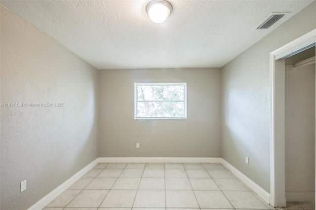 8390 NW 24th St, Sunrise, FL 33322 - unfurnished room featuring light tile patterned flooring