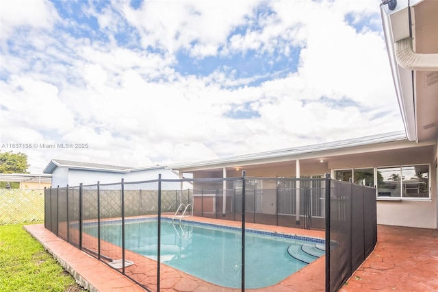 8390 NW 24th St, Sunrise, FL 33322 - view of swimming pool with a patio area