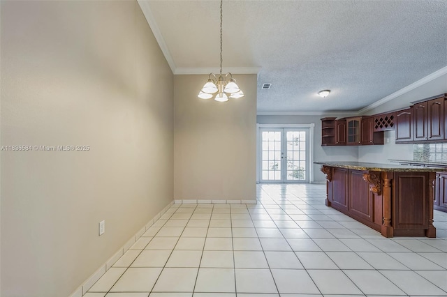5370 SW 144th Ave, Miami, FL 33175 - kitchen featuring ornamental molding, a chandelier, a breakfast bar, open shelves, and a textured ceiling