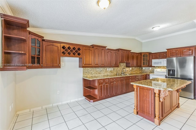 5370 SW 144th Ave, Miami, FL 33175 - kitchen with white appliances, vaulted ceiling, open shelves, glass insert cabinets, and ornamental molding