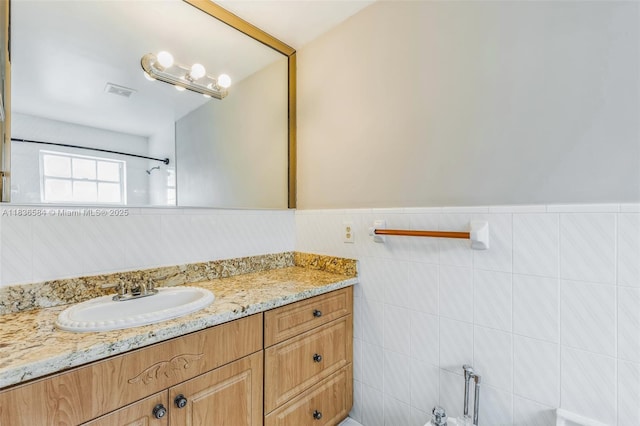 5370 SW 144th Ave, Miami, FL 33175 - bathroom with vanity, wainscoting, and a bidet