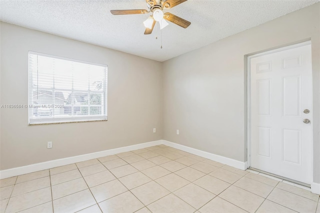 5370 SW 144th Ave, Miami, FL 33175 - unfurnished room with a textured ceiling, ceiling fan, and light tile patterned flooring