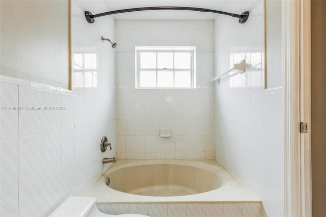 5370 SW 144th Ave, Miami, FL 33175 - bathroom featuring washtub / shower combination and tile walls