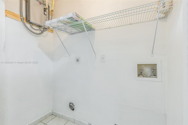 5370 SW 144th Ave, Miami, FL 33175 - washroom with electric dryer hookup, washer hookup, and light tile patterned flooring
