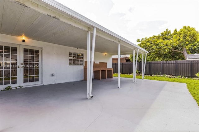 5370 SW 144th Ave, Miami, FL 33175 - view of patio featuring french doors and an attached carport