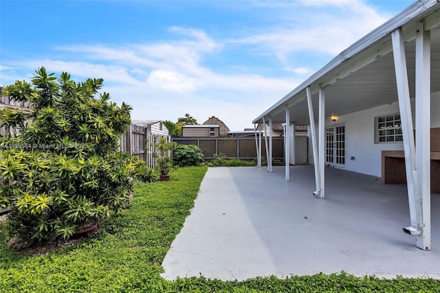 5370 SW 144th Ave, Miami, FL 33175 - view of yard featuring a patio area and french doors