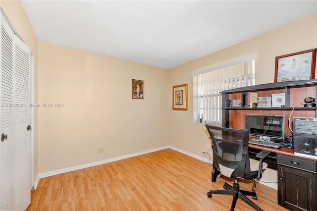 5560 Lakeside Dr Unit 204, Margate, FL 33063 - home office with light wood finished floors and baseboards