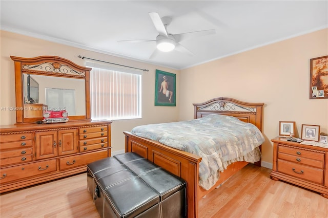 5560 Lakeside Dr Unit 204, Margate, FL 33063 - bedroom with light wood-style floors, ornamental molding, and a ceiling fan