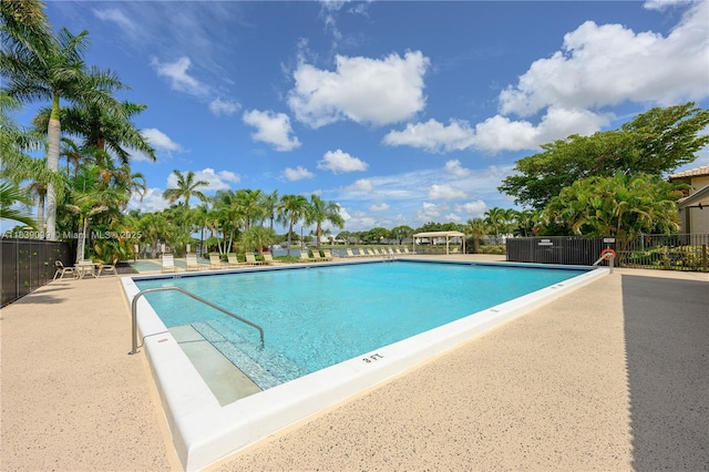 5560 Lakeside Dr Unit 204, Margate, FL 33063 - community pool featuring a patio
