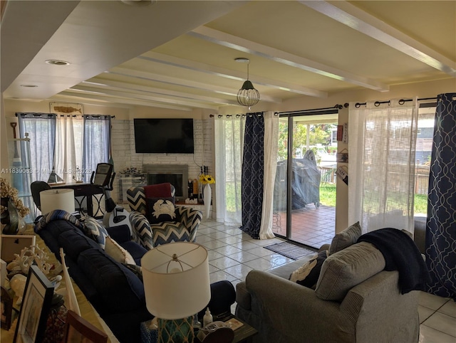 2606 Gulfstream Ln, Fort Lauderdale, FL 33312 - living area featuring light tile patterned floors, beamed ceiling, and a fireplace