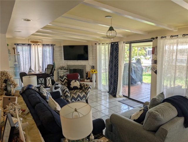 2606 Gulfstream Ln, Fort Lauderdale, FL 33312 - living room featuring light tile patterned floors, a fireplace, and beam ceiling