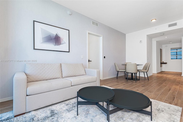 398 NE 5th St Unit 3711, Miami, FL 33132 - living room with wood finished floors and baseboards